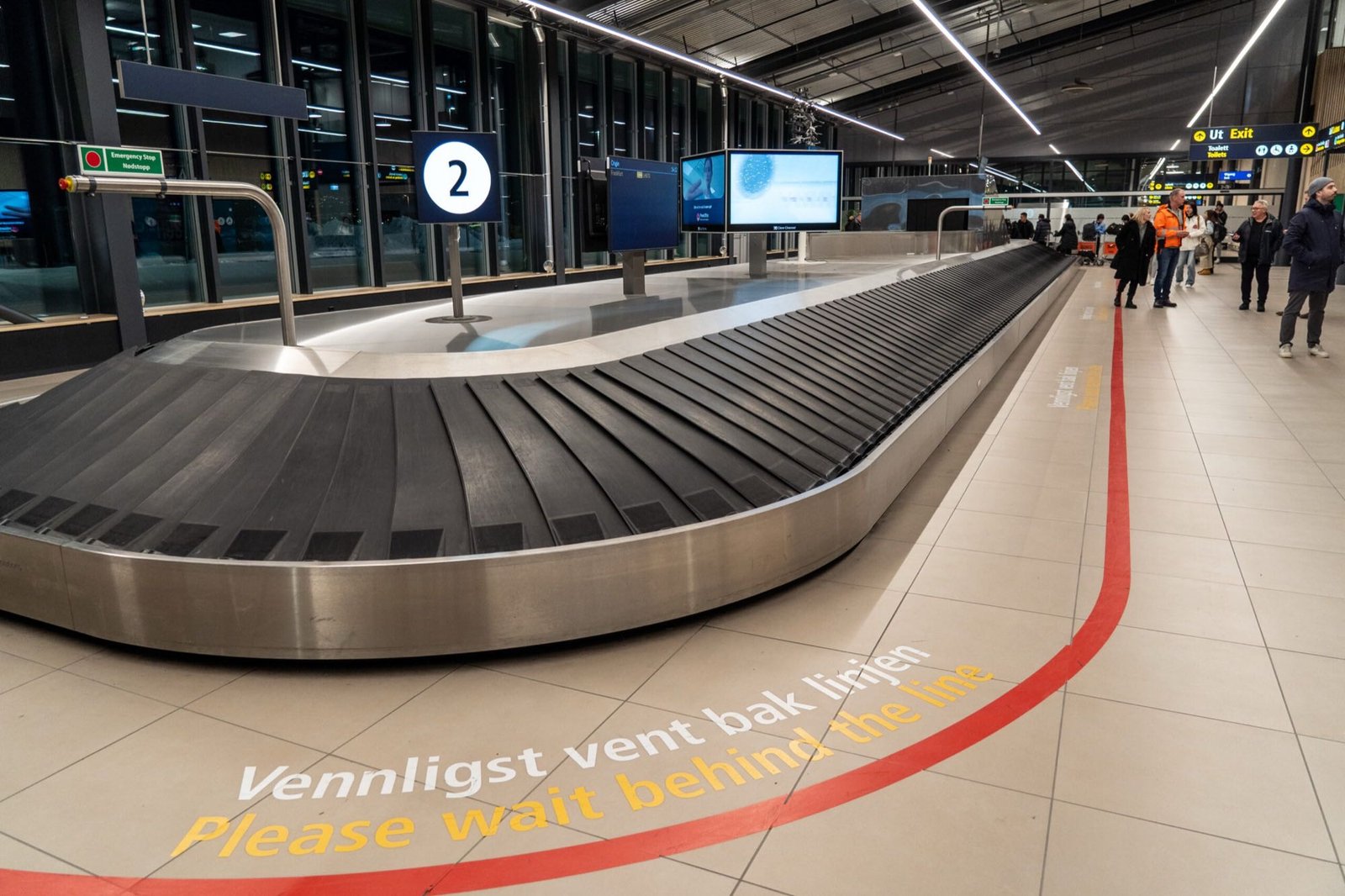 Digitale skjermer over bagasjebåndet i ankomsthallen